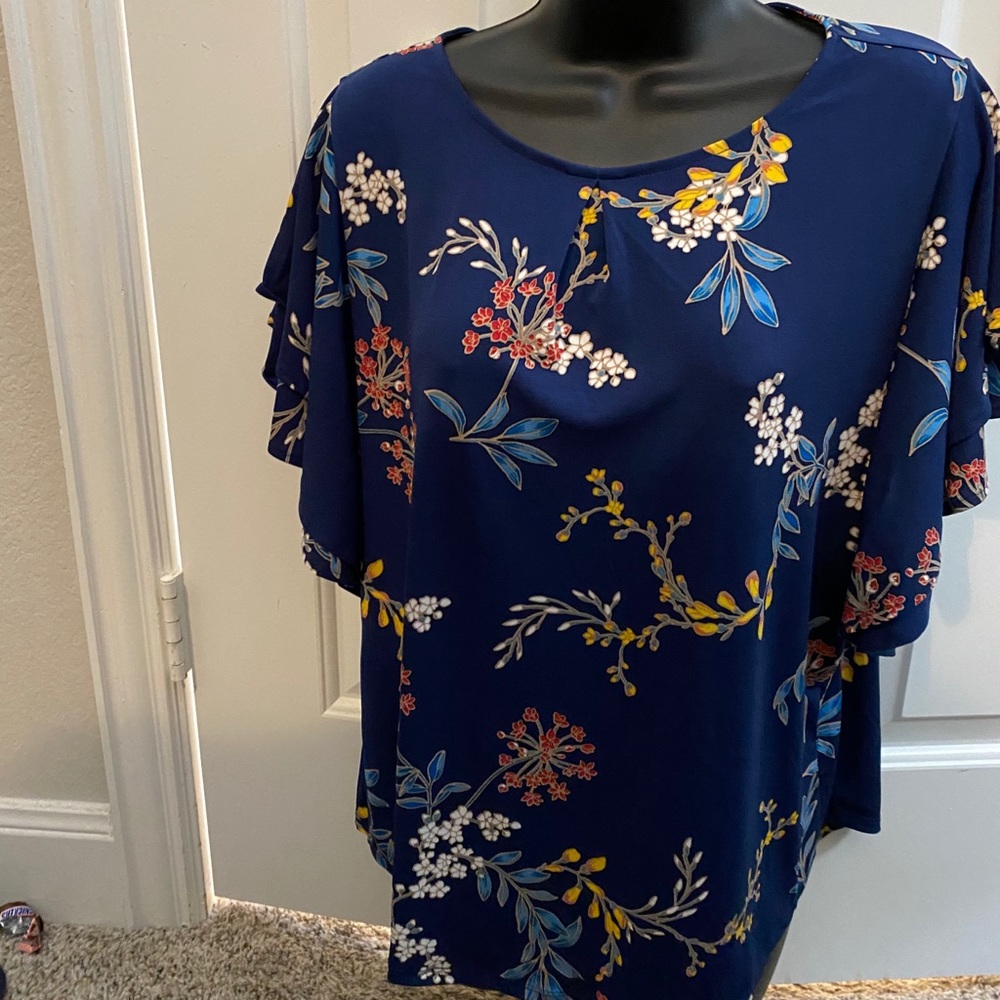Blue flowery flutter-sleeved top
